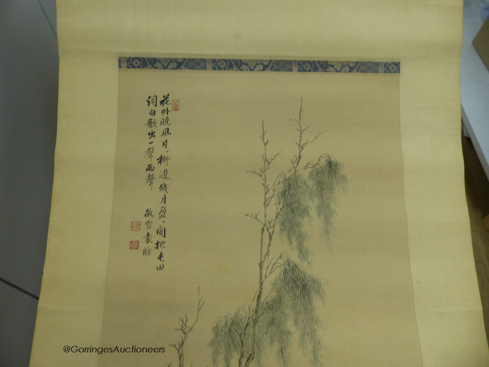 Two late 19th century Chinese scroll paintings, sage in a landscape and buildings in a landscape